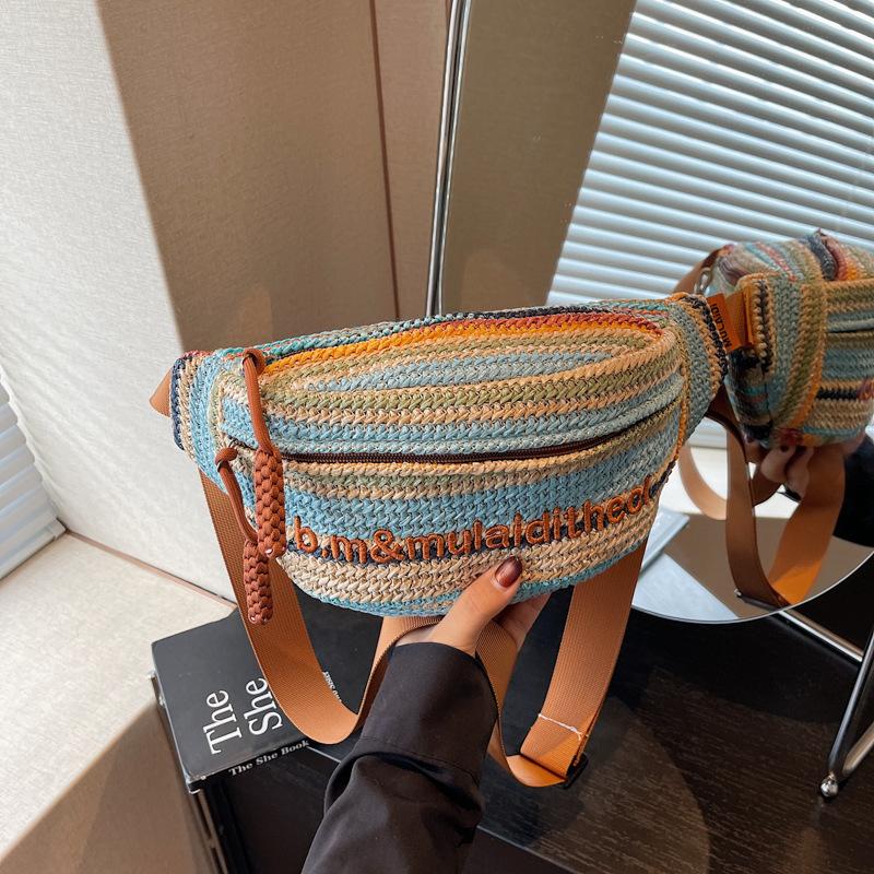 

Summer niche straw dumpling bag women s new shoulder messenger bag high-end woven armpit bag синий