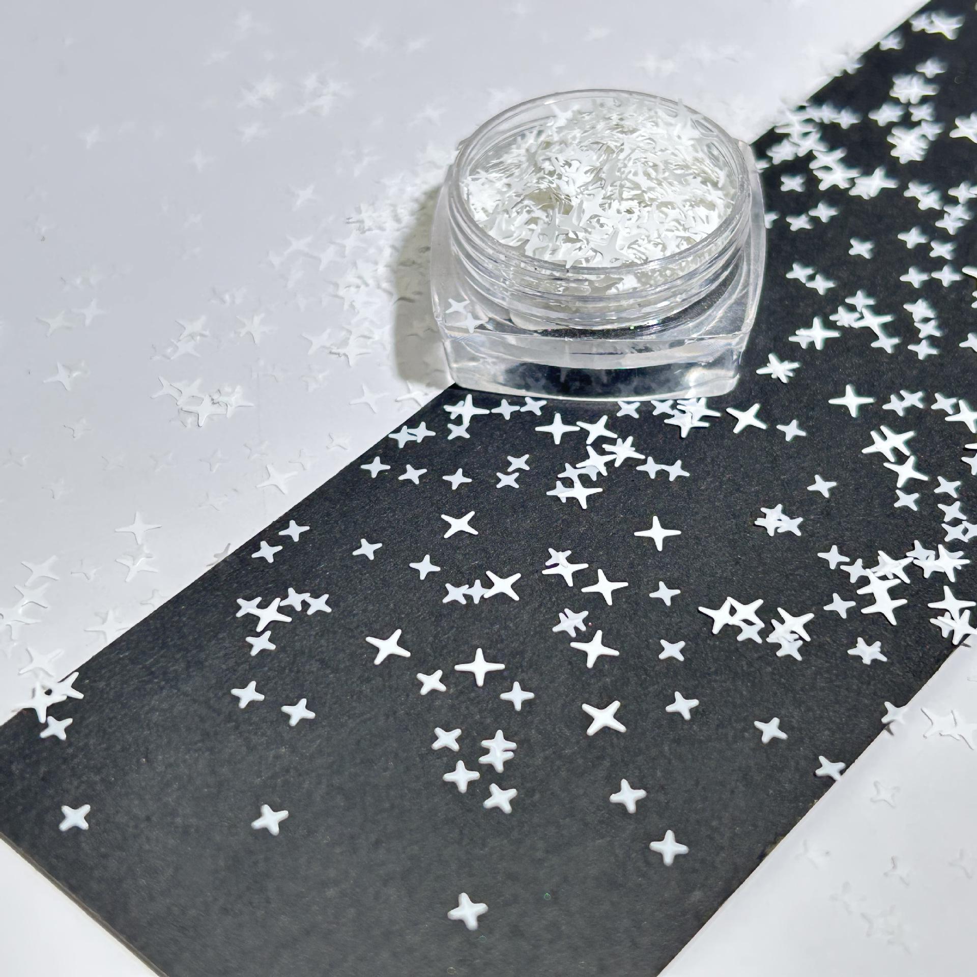 

Mixed Size Black and Silver Glitter Star Nail Art Decorations 30 ml
