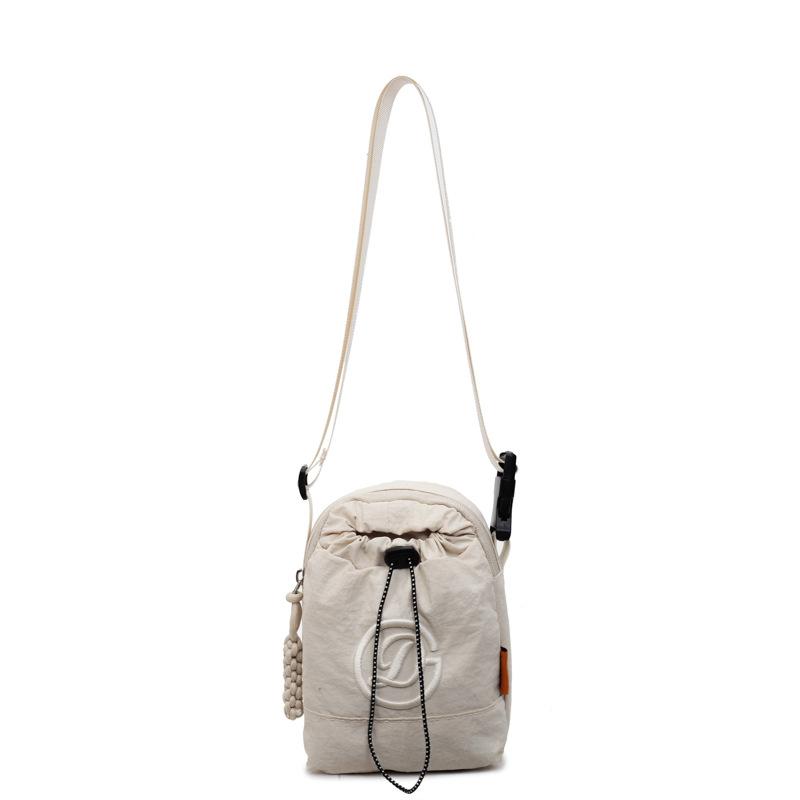 Mobile phone water cup integrated bag kettle bag Japanese women solid color shoulder bag commuter small satchel light travel bag