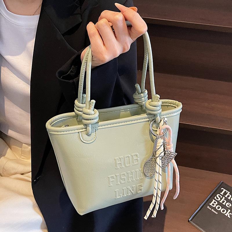 2025 popular new niche simple wind hand carrying bucket bag Korean version casual versatile commuter fashion messenger bag women