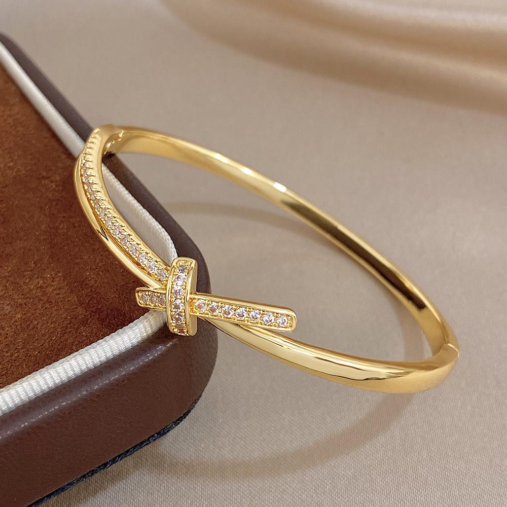 Elegant Twisted Irregular Gold Plated Copper Bangle for Women Sparkling Rhinestone Inlaid Spring Bracelet Holiday Jewelry Gift