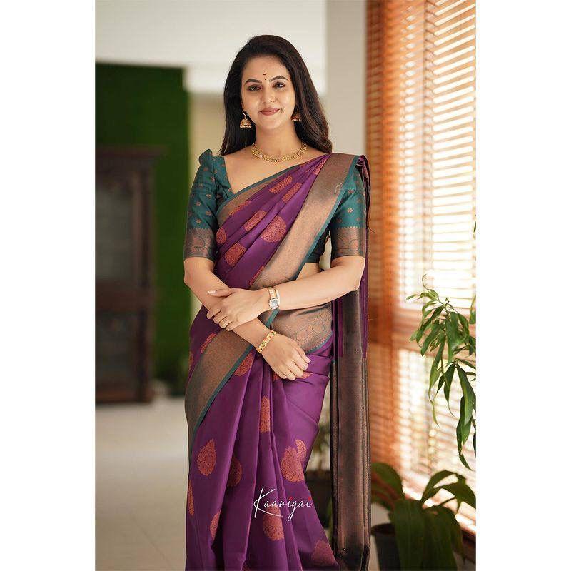 Silk Saree from the ALMAARI Store Is Adorned with Beautiful Zari Work In Form of Traditional Motifs.