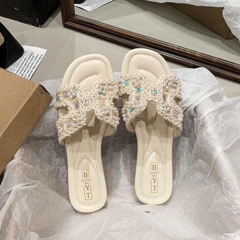 Beautiful flat-bottomed cool slippers for women to wear 2025 summer new fairy style with skirt half-drag beach sandals