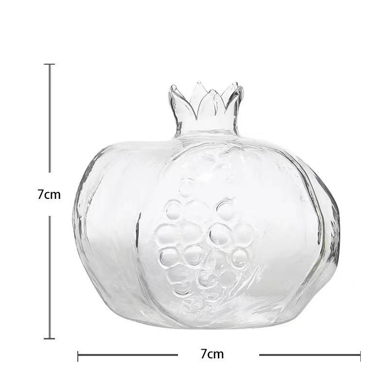 

Handmade Japanese Glass Vase with Hammered Finish and Dried Pomegranate Flower Design