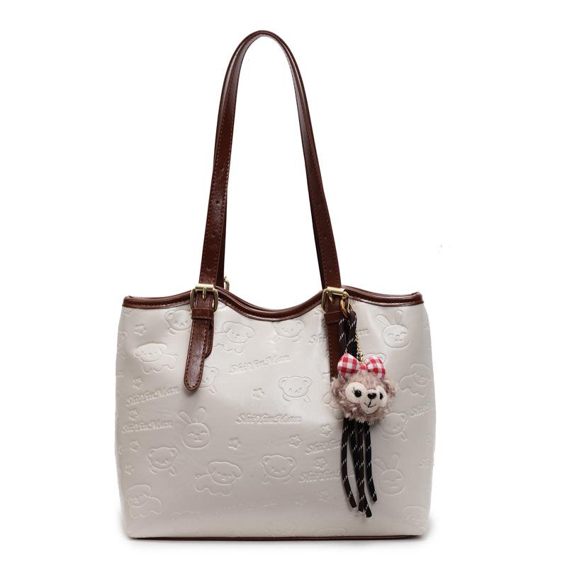 Spring and summer new casual Korean version cute embossed simple wind tote bag large capacity fashionable commuter shoulder women's bag