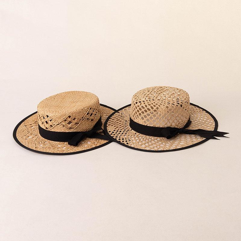 New Elegant Women'S Black Bow Straw Hat Hollow Woven Flat Top Sun Hats For Women Summer Beach Travel Beach Vacation Caps
