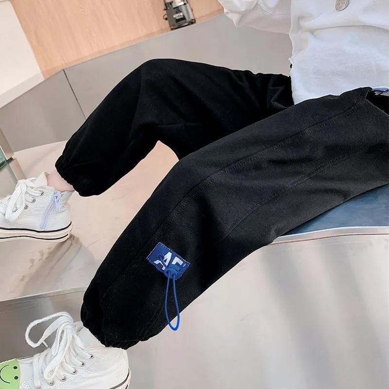 

Брюки для мальчиков и девочек. Детские свободные повседневные брюки. Спортивные брюки. Весенние и осенние студенческие брюки. Верхняя одежда. 110 чёрный