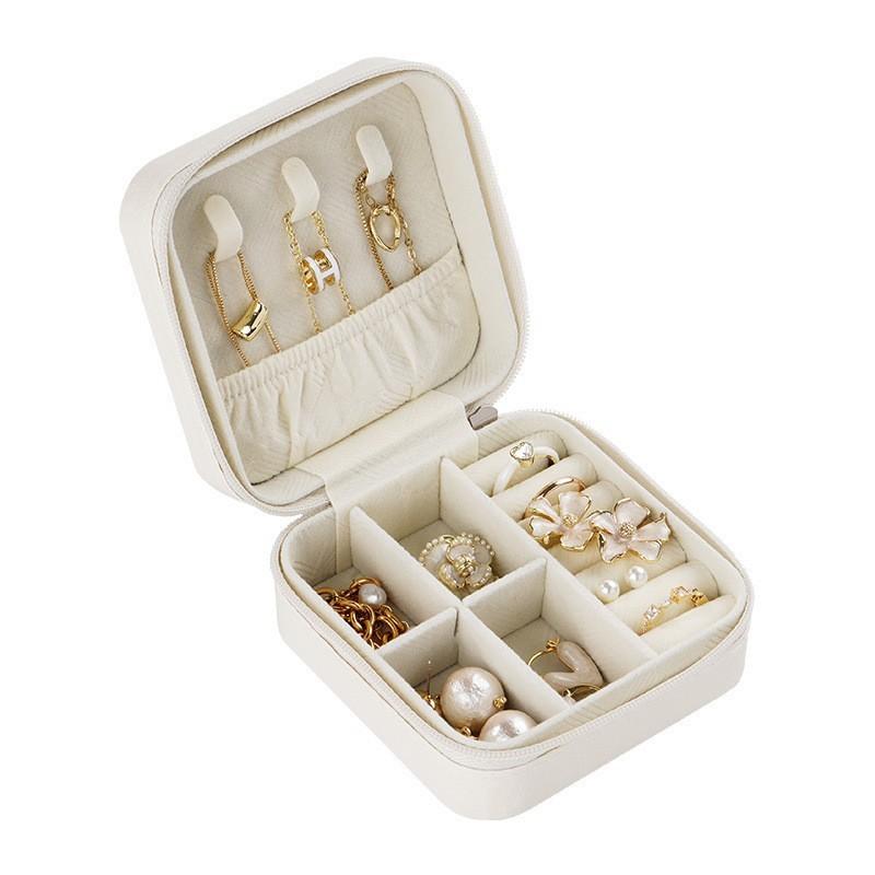 Classic Leather Jewelry Box With Compact Design For Travel And Gift Use
