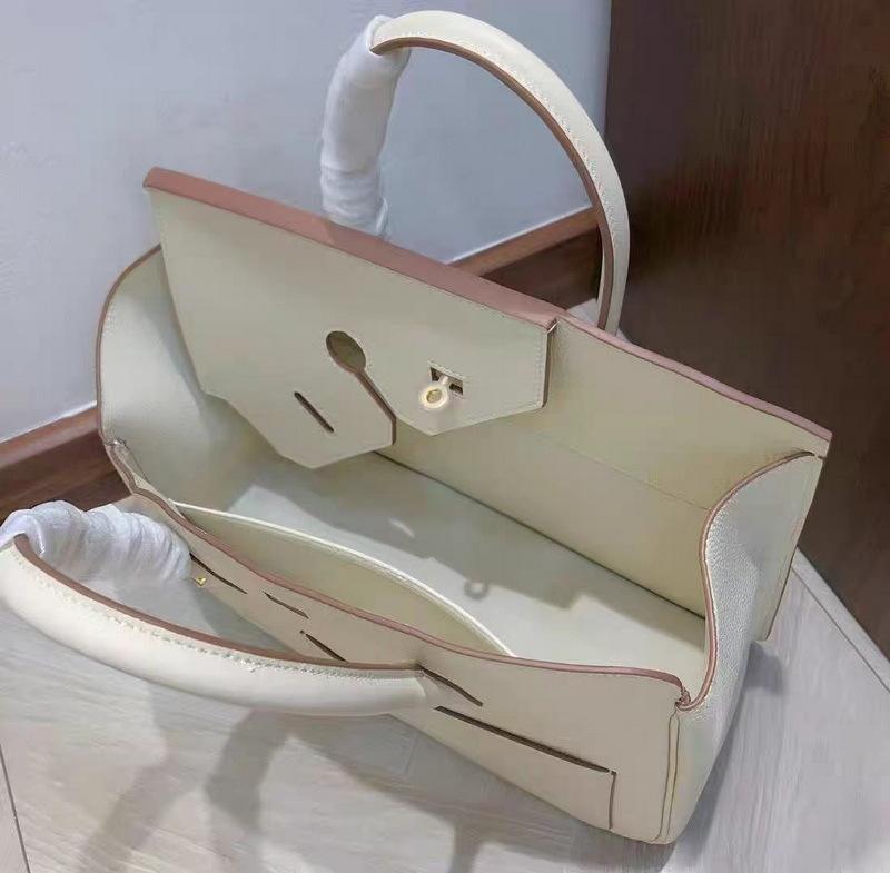 New genuine leather women's bag top layer cowhide 30CM irregular diagonal hijab Desordre handbag