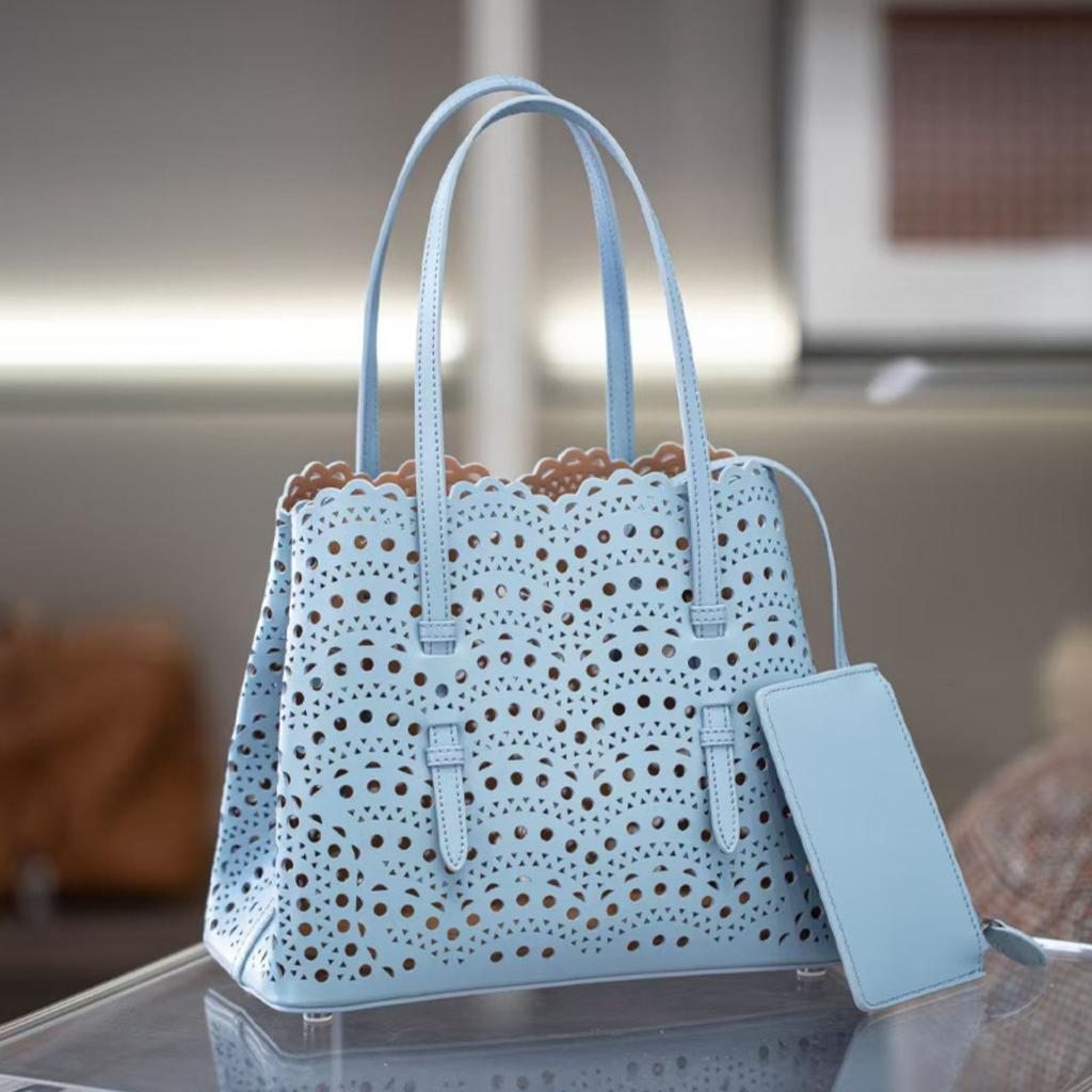 Velkoobchodní továrna prémiová niche vyřezávaná dutá taška na zeleninu Mina kožená dámská taška přes rameno crossbody tote taška