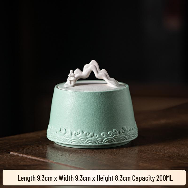 Chinese-Style Ceramic Tea Caddy: Small Mountain Viewing Sealed Jar with Moisture-Proof Packaging for Red and Green Pu'er Tea