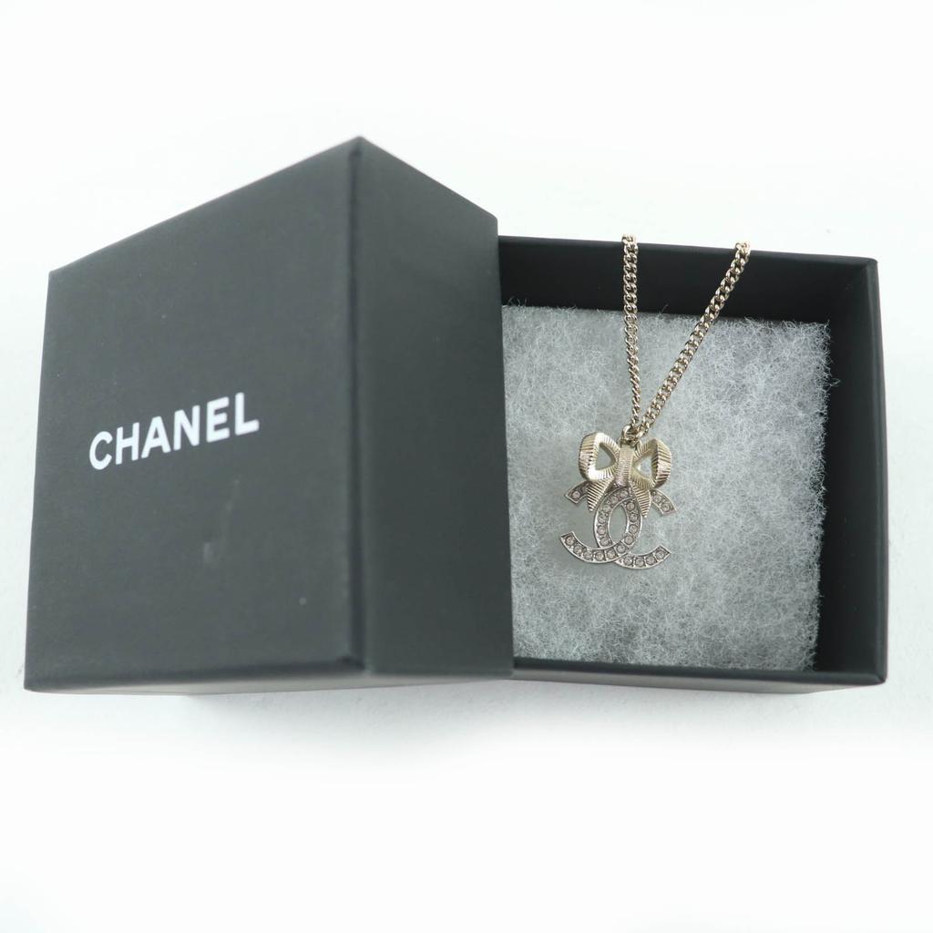 Excellent CHANEL Necklace COCO Mark Ribbon Rhinestone Champagne Gold Women B24K Used
