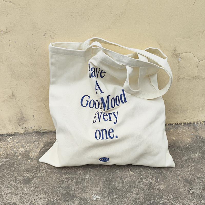 Source Blue letter embroidered canvas bag niche simple shoulder canvas bag women