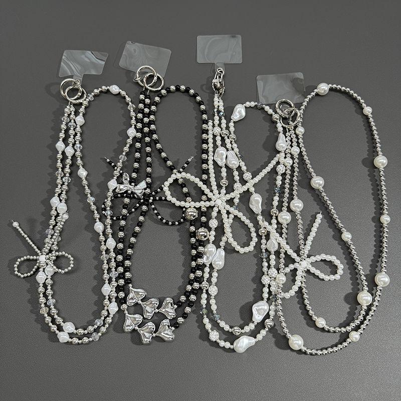 INS Silber Perle Herz Schleife Handykette Crossbody Hals hängend CCD Kamera Kette Taschenanhänger für Frauen