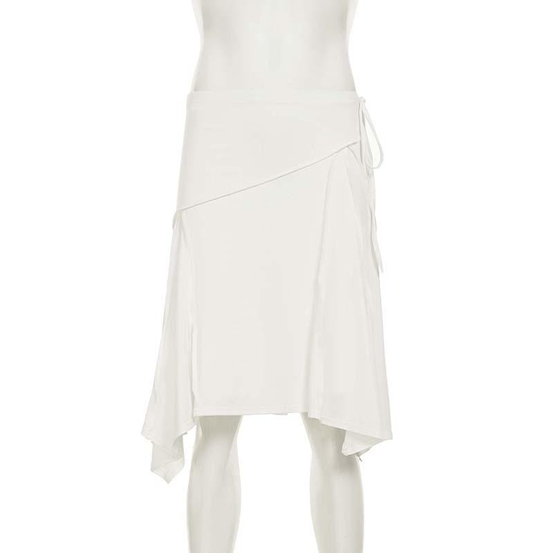 Elegant French White Irregular Half Skirt with Flowing Drape, Side Tie, and Low Waist Design
