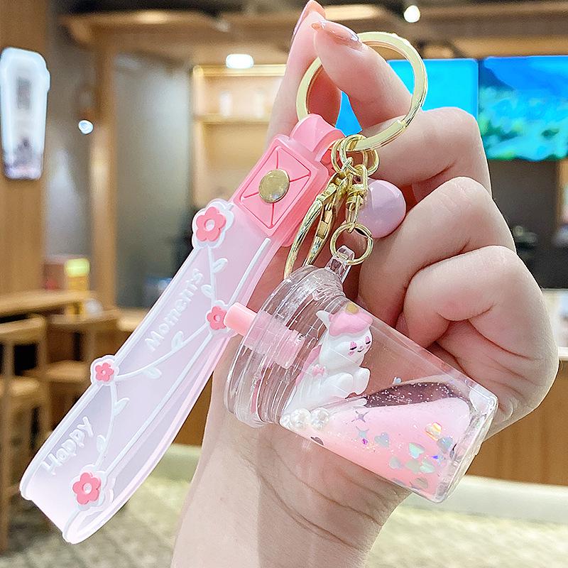 Lila Stern Flüssiger Treibsand Schlüsselanhänger mit Kirschblüten Öl-gefülltem Anhänger - Niedlicher 3D Rucksackanhänger für Frauen