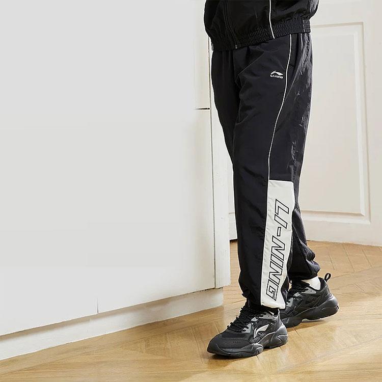 Li-Ning Trendy Colorblock Loose Tapered Knit Sweatpants Men Bottoms Black AYKS837-3