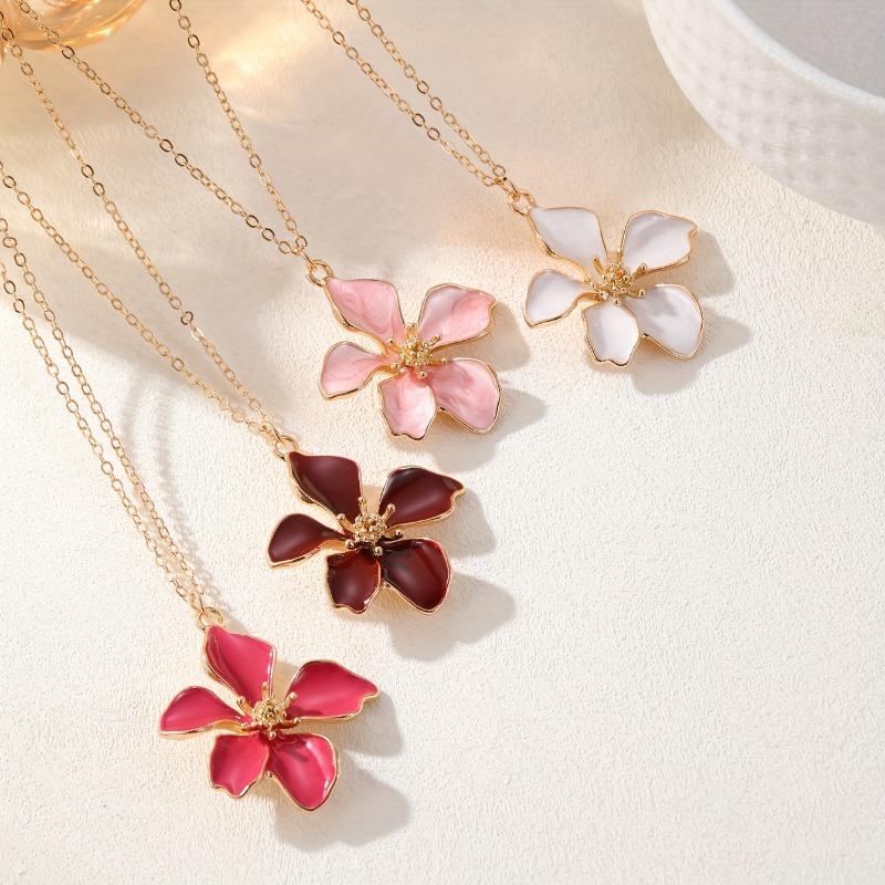 Fashion flower pendant necklace with white enamel petals. Elegant daily jewelry for casual, formal and vacation wear, perfect gift for women.