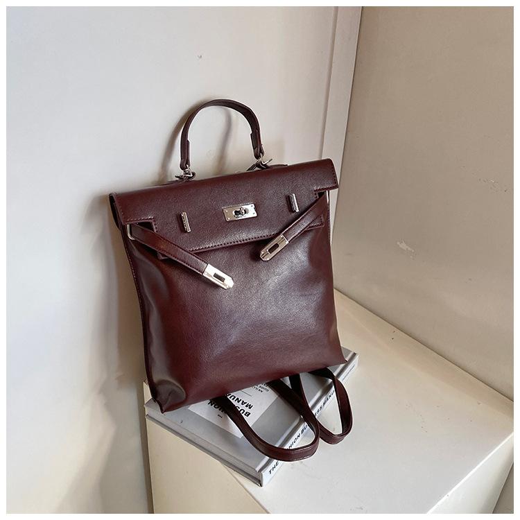 

Рюкзак женский большой вместимости 2025 новый повседневный портативный платиновый мешок школьный мешок нишевый легкий дорожный рюкзак бордовый