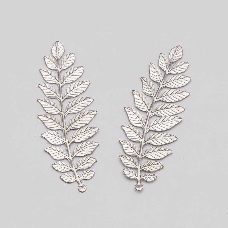 

Engood 100Pcs Rhinestone Leaves Button Sewing Trim & Embellishments Craft Buckle for DIY Jewelry Earring Pendants Antique Hair срібний
