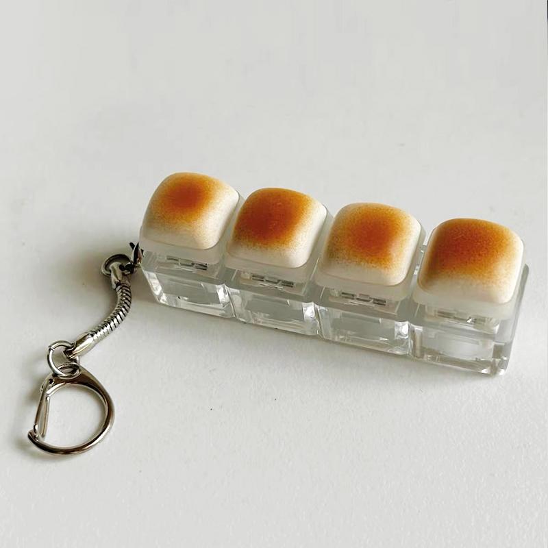 Fidgets Toy Caramel Bread Stress Relief Keyboard Keychain Sensory Toy for Stress Relief Keyboard Keychain Gadget for Adults Kids