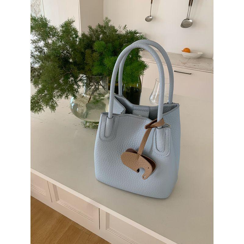 

Korean Series Niche Vegetable Basket Bucket Bag 2025 Spring New Tote Bag Commuter Shoulder Shoulder Portable Small Bag Fog Blue