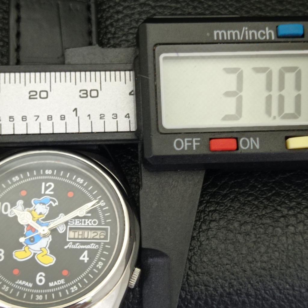 USED VINTAGE SEIKO AUTOMATIC 7009A JAPAN MENS CARTOON BLACK DIAL WATCH a433911-2 R119-a433911