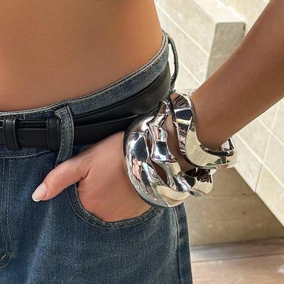 Conjunto de pulsera metálica en espiral con diseños europeos y americanos, con círculos irregulares