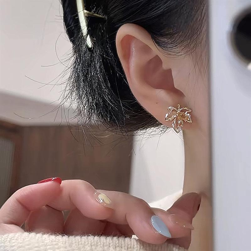Elegant Hollow Maple Leaf Stud Earrings for Women 2025 - Chic, Light Luxury, Unique Trendy Accessories.