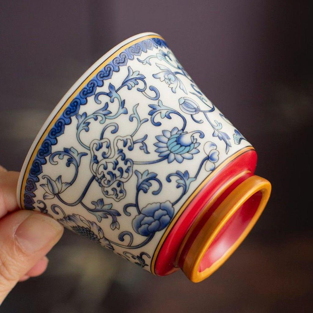 Blue and White Porcelain Lotus Kung Fu Tea Set: Enamel Teacup, Hovering Lid, Teapot, Saucer, and Master Cup.
