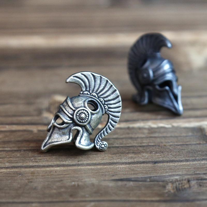 Helma spartského římského válečníka Mosazné korálky na nůž Venkovní EDC nástroj Paracordový náramek na klíče s přívěsky Pletené lanové náramky Příslušenství