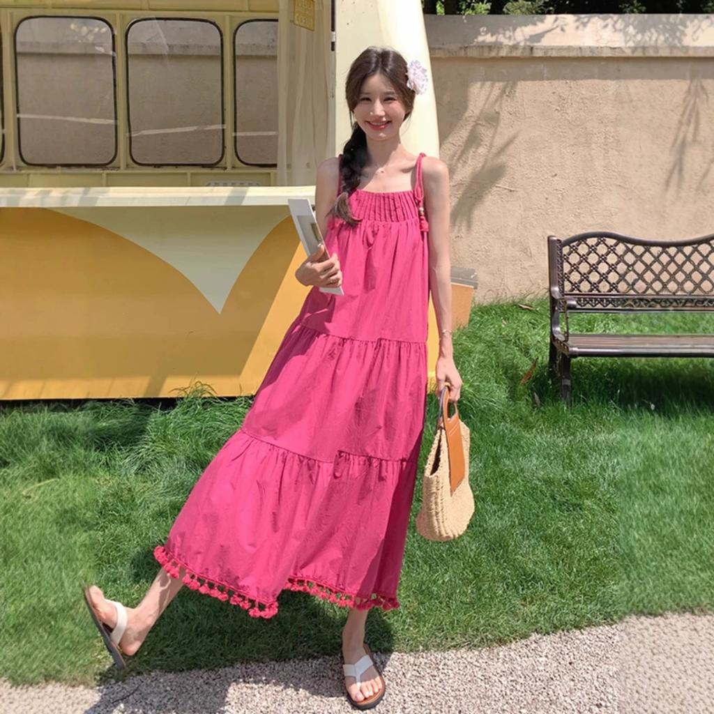 Summer 2026 new women's clothing vacation dragon fruit color fringed strap dress temperament pendulum long skirt