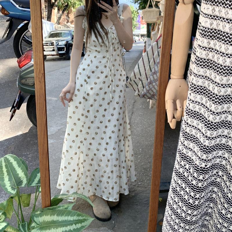 Damen Sommer Mode Sanfter Wind Süßes Blumenkleid Design Sinn Schlank Ärmellos A-Linie Neckholder Langes Kleid