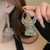 Retro ethnic style round hollow earrings Bohemian temperament elegant earrings niche fashion light luxury earrings women