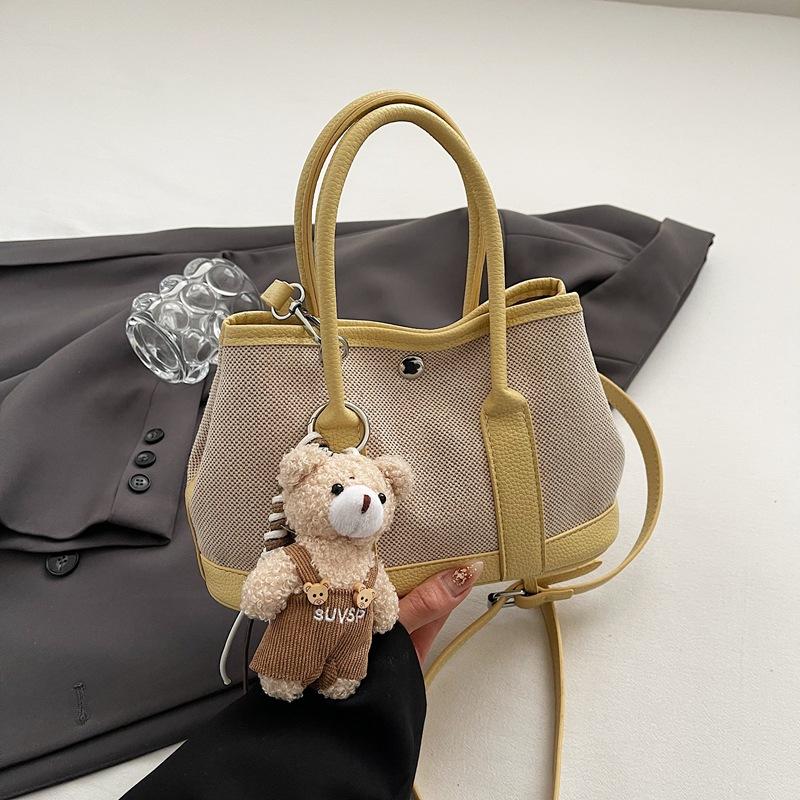 Summer new fashion contrast large-capacity hand-held bucket bag women's simple casual commuter shoulder body bag