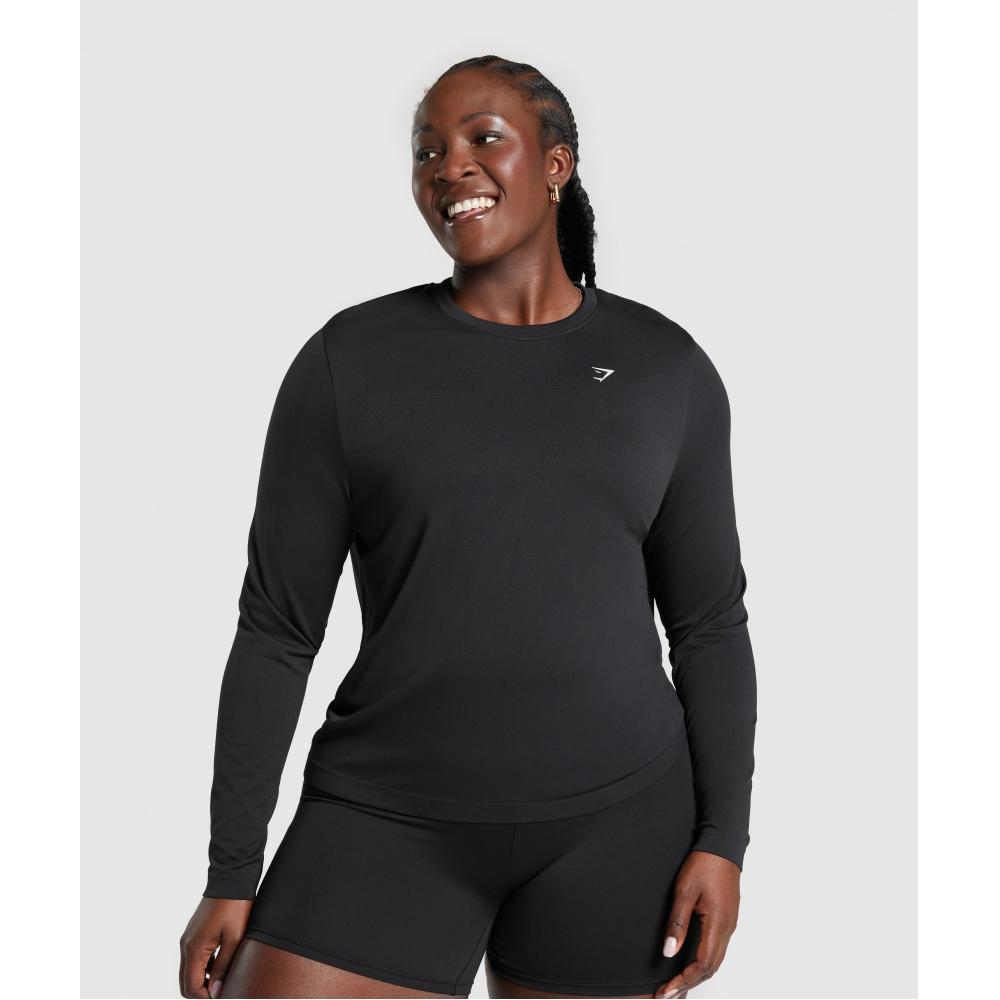 Gymshark Camiseta de manga larga sin costuras para uso diario, color negro, talla B8a4q y talla Bb2j