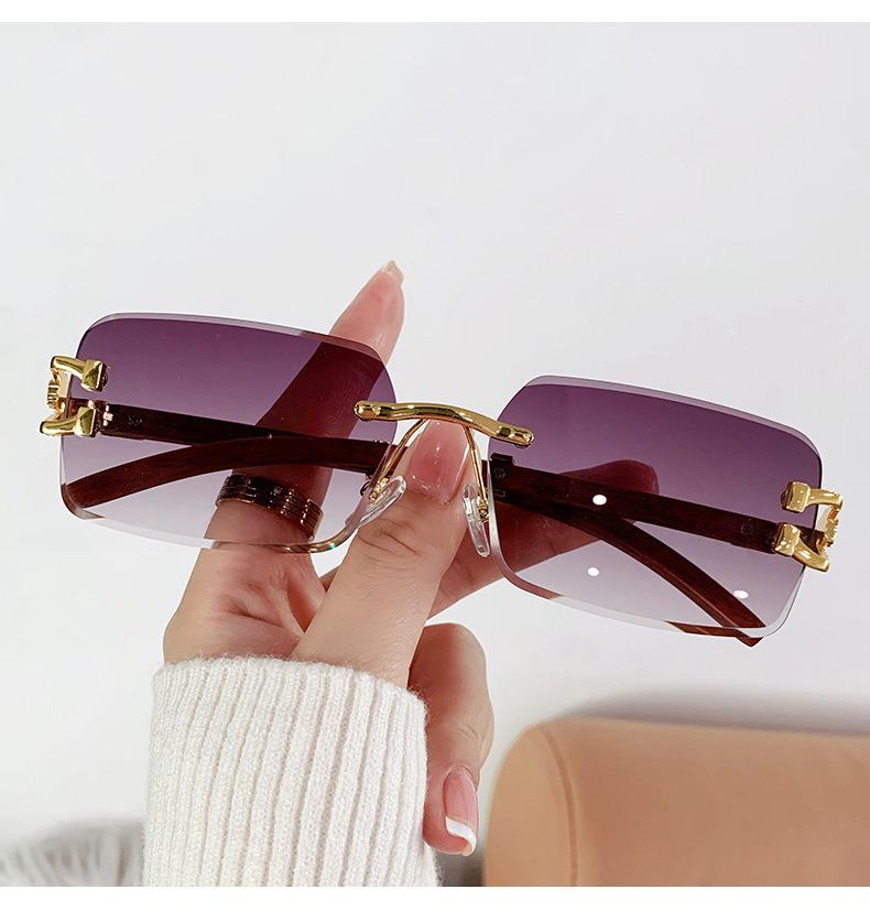 2026 Frameless Faux Wood Grain Leopard Head Men's Square Sunglasses with Leopard Temple.