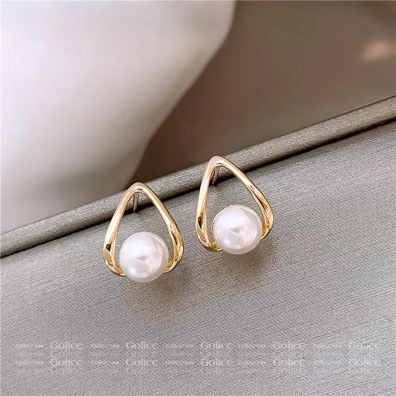 

Серьги-пусеты из серебра 925 пробы с жемчугом в форме сердца и каффами - Трендовый дизайн 2023 года