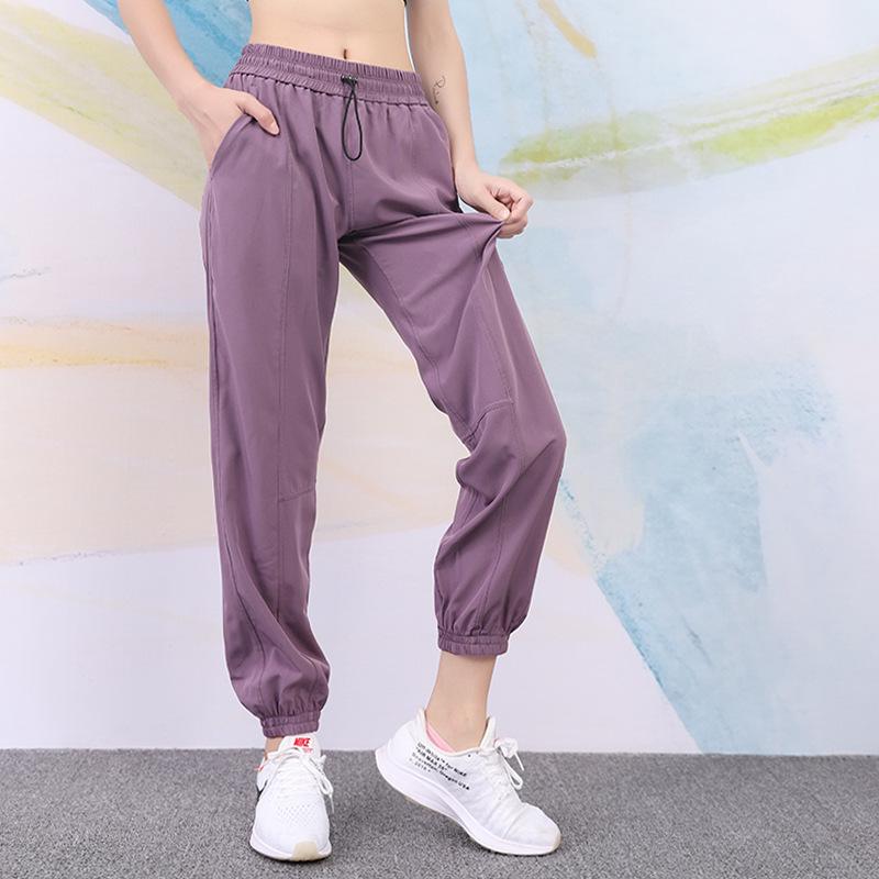 High Waist Quick-Dry Women's Yoga Leggings - Versatile for Running, Sports, and Casual Wear.
