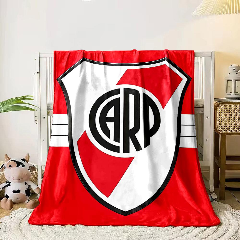A shield with red diagonal stripes and bold "CARP" letters in the center. for all seasons blanket lunch break throw gift