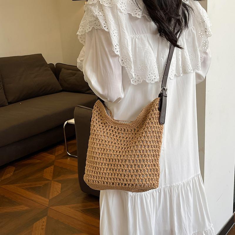 Niche woven hollow bag women's new summer seaside vacation tote bag casual shoulder messenger bag