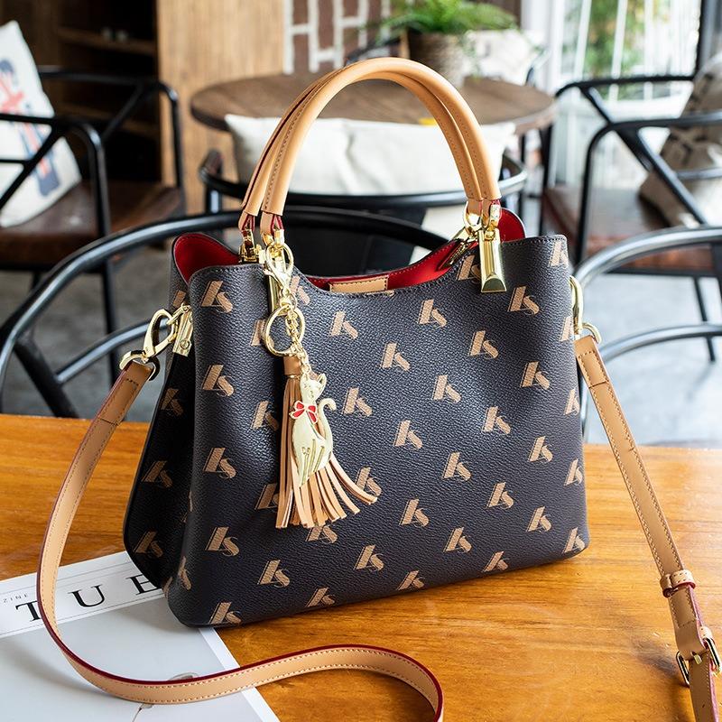 

Женская сумка из натуральной кожи люксового бренда, темпераментная женская сумочка, атмосферная сумка-тоут с принтом темно-коричневого