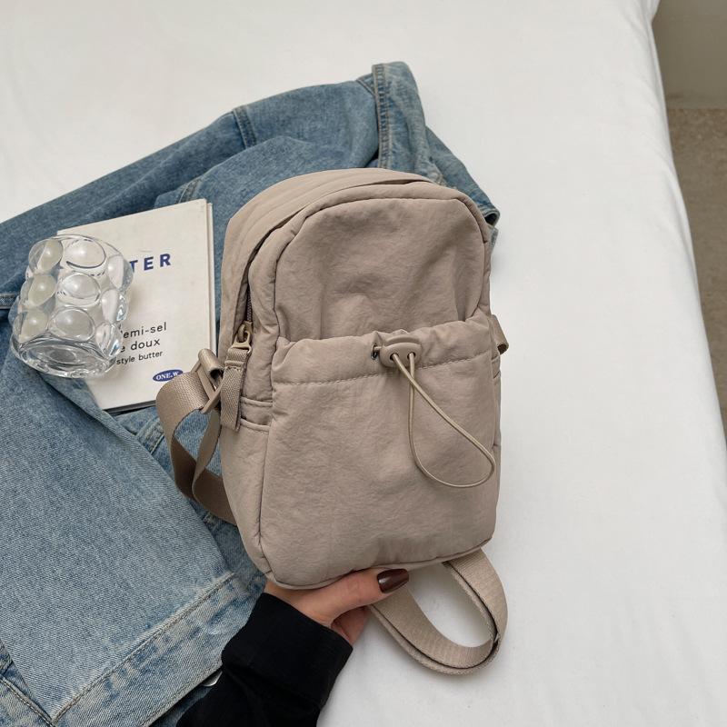 

Japanese solid color retro nylon cloth bag women s fashion new trendy simple mobile phone bag going out shoulder messenger bag