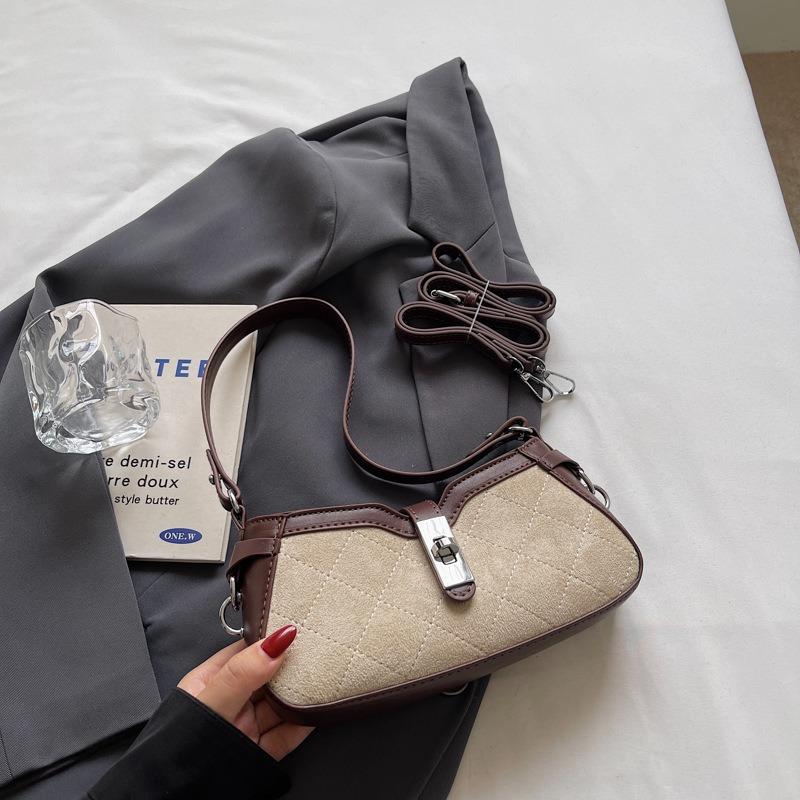 High-End Mode Baguette Handtasche Damen Frühling neu Nische Textur Schulter Messenger Bag Pendler Tasche