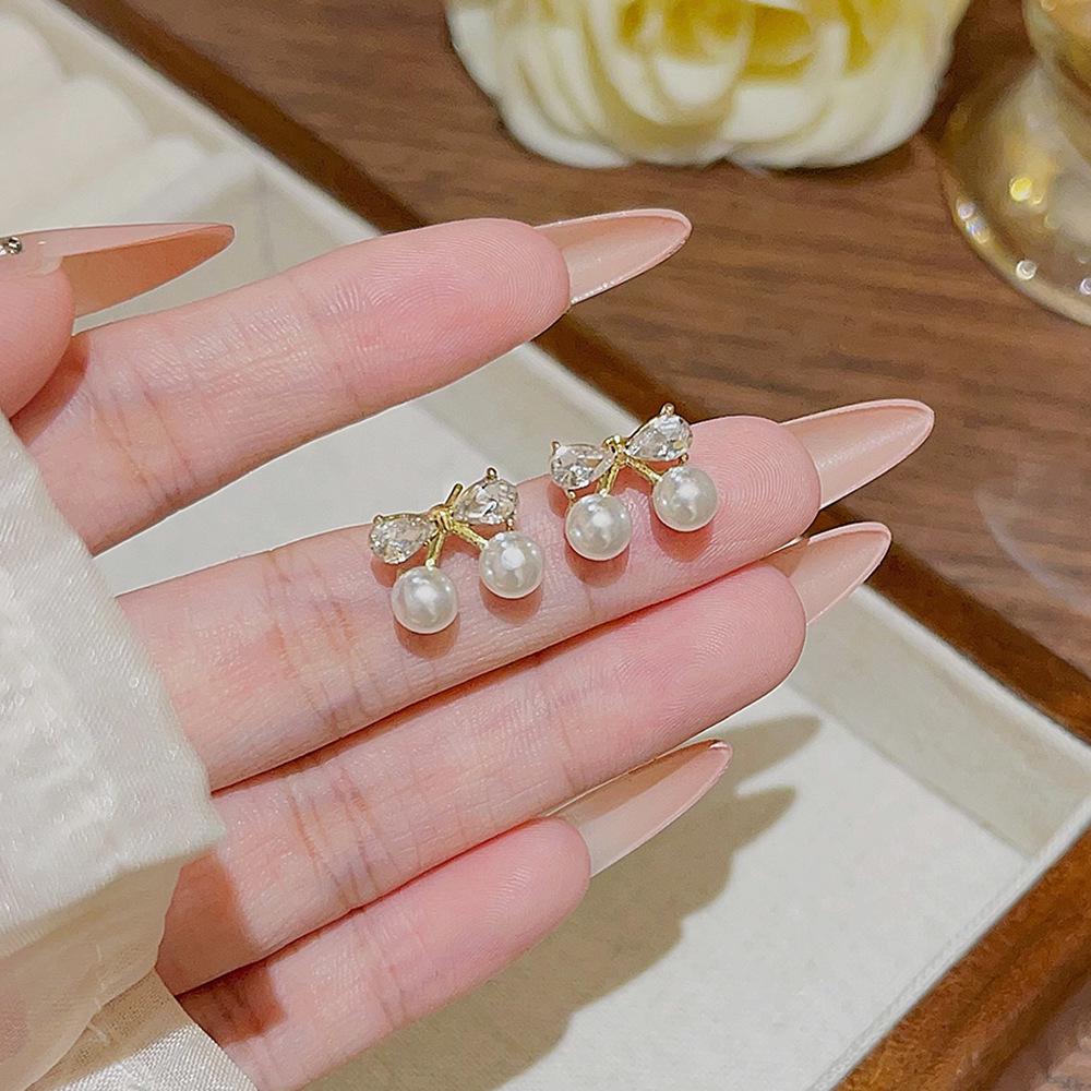 

Korean Style Bow Pearl Stud Earrings - Elegant and Fashionable Women s Exquisite Earrings