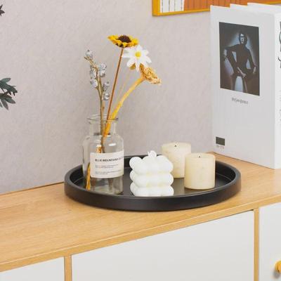 Runder, schwarzer Kerzenständer: Multifunktionales Aromatherapie- und dekoratives Aufbewahrungsornament.
