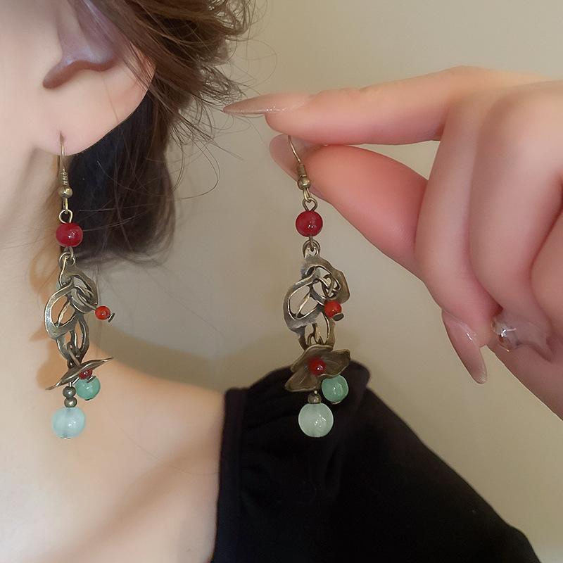 Bohemian ethnic style fringed earrings long niche woven feather earrings new travel wear earrings women