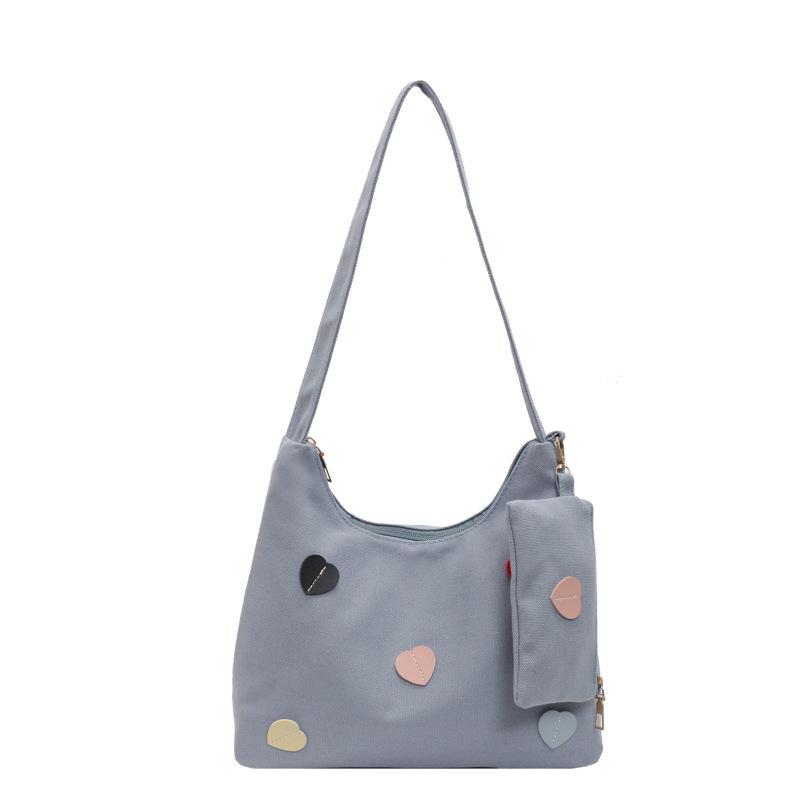 

2024 new new women s bags, large-capacity bags, women s love design sense, single shoulder tote child and mother bag tide синій