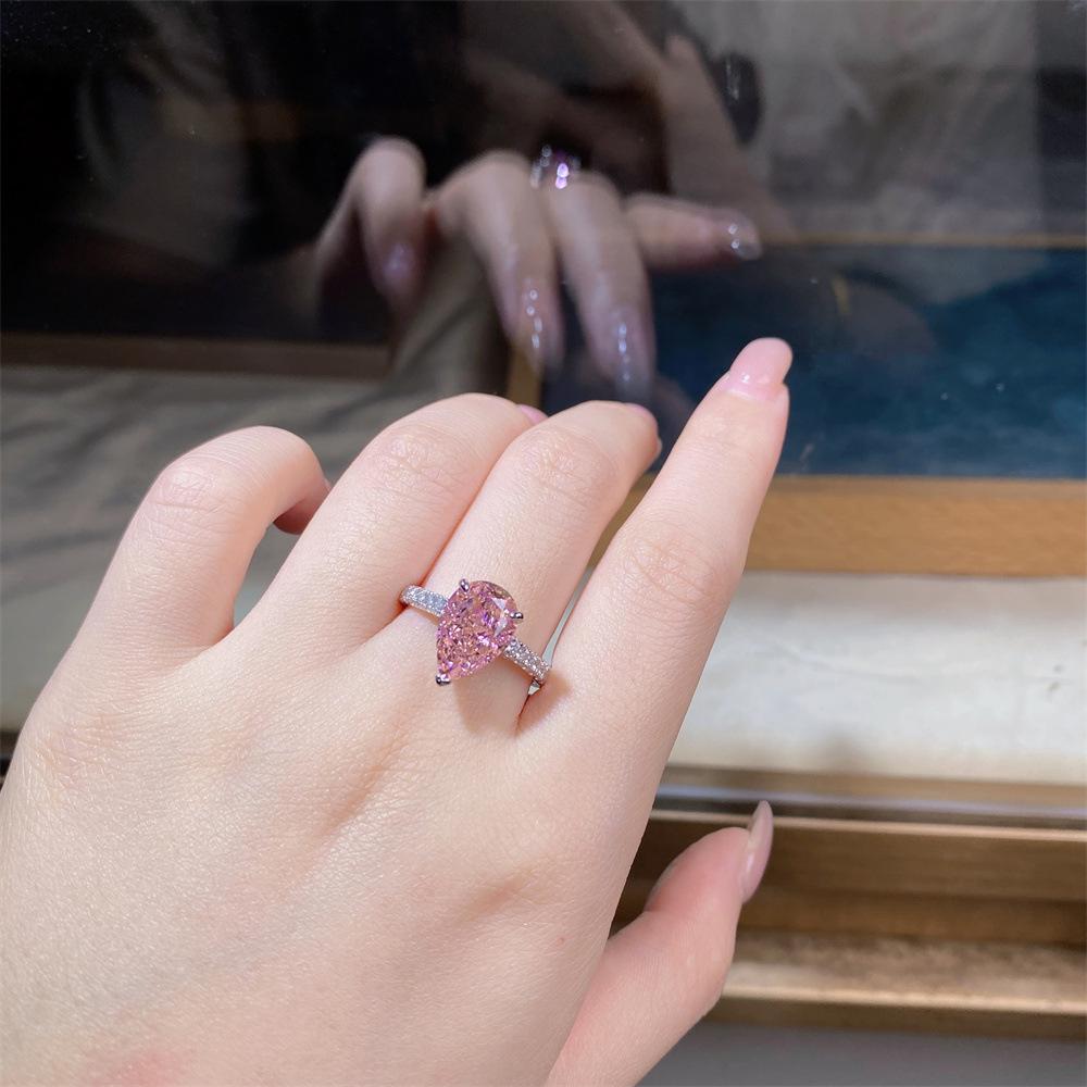 Nine Beauty Jewelry Teardrop Zircon Ring: S925 Sterling Silver, Pink High-Carbon Diamond, European & American Ice Flower Cut.