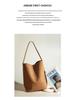 Guangzhou Women's High-End Frosted Leather Bucket Bag - Versatile, Solid Color, Large Capacity Handbag for Commutes